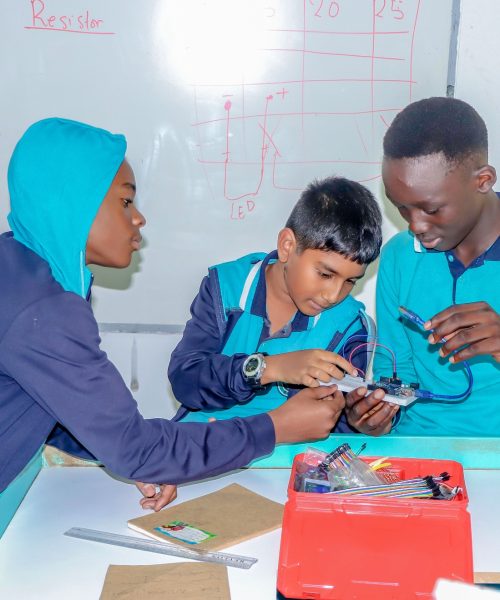 Children in class doing the practice